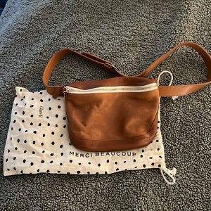 Clare V. Fanny pack in cognac brown leather.